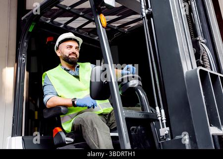 Work in warehouse, loading organic fruits for sale and production of juices Stock Photo