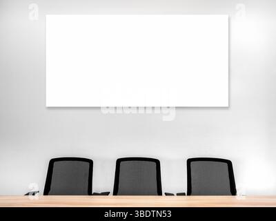 Empty white blank long horizontal rectangle frame, mockup artwork or picture frames, hanging on clean plain wall above three black chairs and wooden t Stock Photo