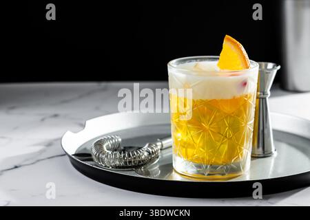 Classic cocktail whiskey sour on black background Stock Photo