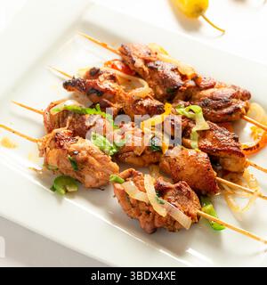Shish Tawook – Chicken Thigh Cubes – Middle Eastern Food – Isolated on White Background Stock Photo