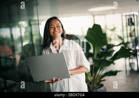 Software engineer using laptop computer with global network connection, Technology, innovation Stock Photo