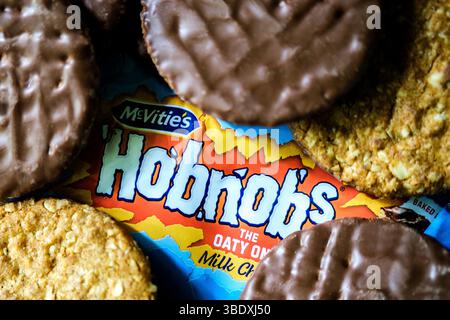 London UK, May 26 2025, Milk Chocolate Covered Oaty Baked McVities Hobnob Biscuits Stock Photo