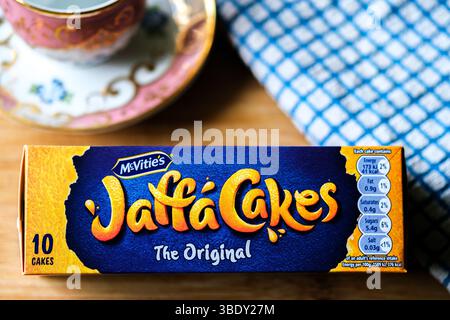 London uk, May 26 2025,  Chocolate Covered Orange Filled McVities Jaffa Cake Sponge Cakes or Biscuits Stock Photo