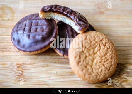 London uk, May 26 2025,  Chocolate Covered Orange Filled McVities Jaffa Cake Sponge Cakes or Biscuits Stock Photo