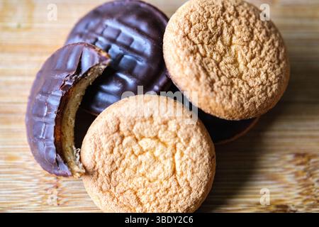 London uk, May 26 2025,  Chocolate Covered Orange Filled McVities Jaffa Cake Sponge Cakes or Biscuits Stock Photo