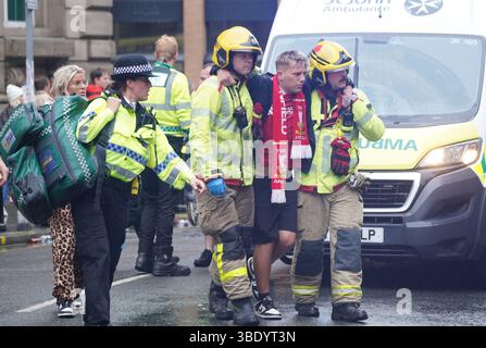 Police and emergency personnel dealing with a road traffic accident on Water Street near the Liver Building in Liverpool after a car collided with pedestrians during the Premier League winners parade. A man has been detained. Picture date: Monday May 26, 2025. Stock Photo