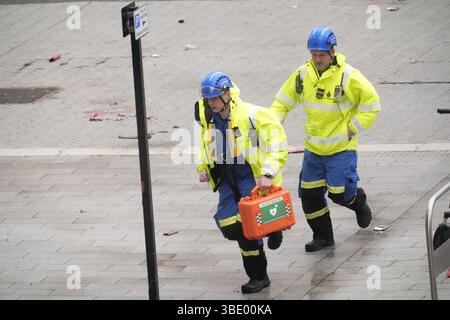 Police and emergency personnel dealing with a road traffic accident on Water Street near the Liver Building in Liverpool after a car collided with pedestrians during the Premier League winners parade. A man has been detained. Picture date: Monday May 26, 2025. Stock Photo
