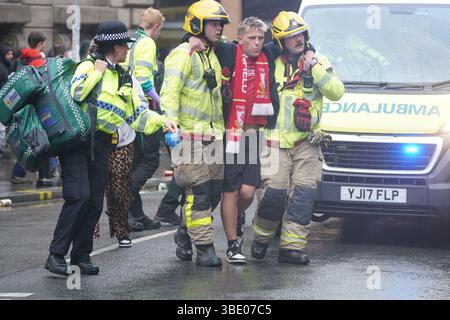 Police and emergency personnel dealing with a road traffic collision on Water Street near the Liver Building in Liverpool after a car collided with pedestrians during the Premier League winners parade. A man has been detained. Picture date: Monday May 26, 2025. Stock Photo