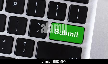 Word Submit on green button of keypad Stock Photo
