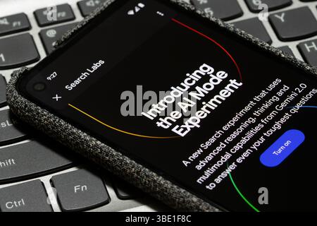 Introduction to the AI Mode experiment is seen in the Google app on the screen of a Google Pixel smartphone. Stock Photo
