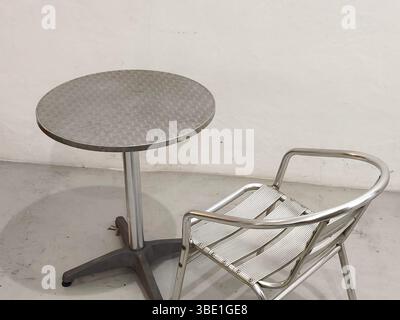 An empty round tables and chairs in the room Stock Photo