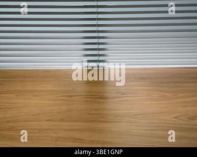 A wooden table texture with a curtain background Stock Photo