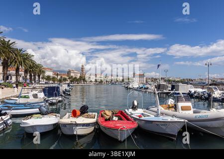 Small boats in Split marina / harbour with view of Split old town, Split, Croatia, Europe Stock Photo