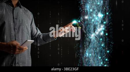 Digital technology and big data are accessible to individuals. A man with a smartphone interacts with real-time data and global info in an era of digi Stock Photo