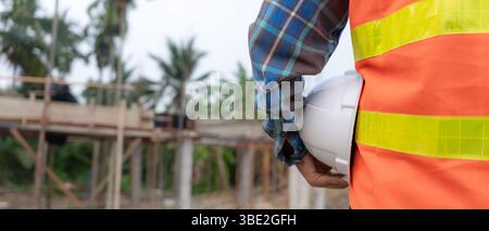 helmet safety for engineer Mechanic or maintenance or electrical, electrical control systems industrial plant. Utility fore man daily check power syst Stock Photo