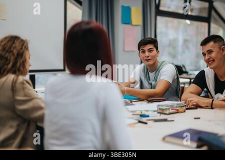 Students engaged in a collaborative classroom discussion Stock Photo