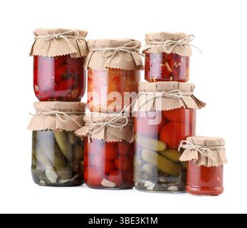 Many jars with different pickled products isolated on white Stock Photo