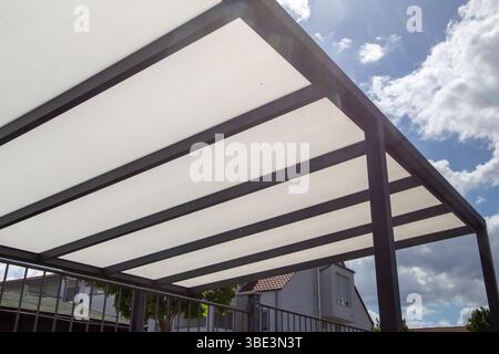 Aluminium terrace roofing on a residential building Stock Photo