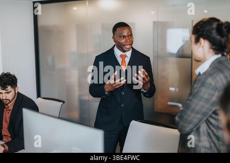 Colleagues Collaborating in a Modern Office Setting on Business Projects Stock Photo