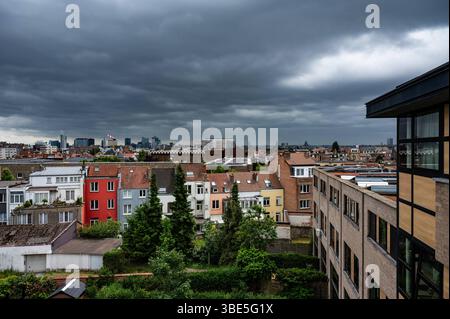 Skyline with houses and backyards over a residential area of Jette and Molenbeek in Brussels, Belgium, 27 May 2025 Stock Photo