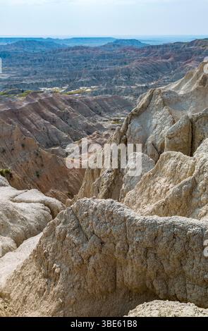 Erosion exposes colorful layers of sedimentary rock in the Badlands ...