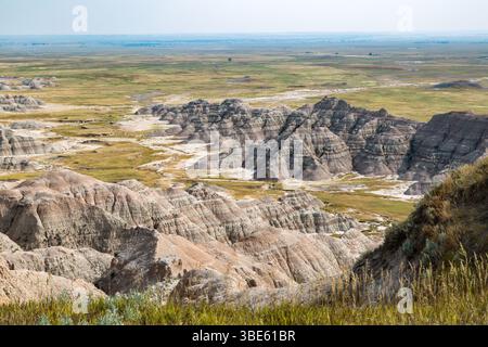Erosion exposes colorful layers of sedimentary rock in the Badlands ...