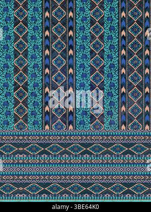 Teal and navy blue ethnic textile pattern design with geometric motifs and tribal inspired borders Stock Vector
