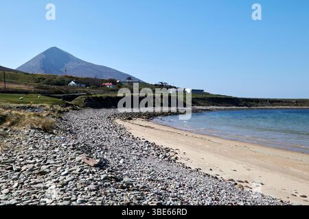 upper pebble area of golden strand or barnyagappul strand dugort with a view of slievemore achill island county mayo republic of ireland Stock Photo