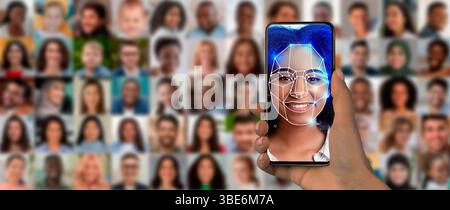 A hand holds a smartphone displaying a digital face scan Stock Photo