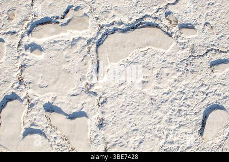White paint on the street close up. Background texture Stock Photo