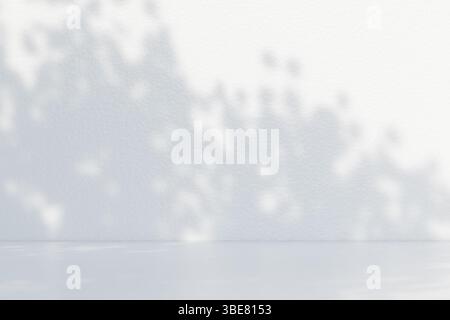 Soft shadows of tree branches create an abstract pattern on a plain white wall. 3d rendering Stock Photo