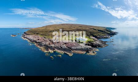 aerial view of Rua Reidh Iighthouse at the rocky west coast of Scotland near Gairloch Stock Photo
