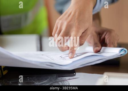 Green tech focus on sustainable architectural plans and designs Stock Photo