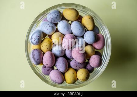 London UK, May 28 2025, A Bowl Of Sugar Coated Chocolate Eggs Confectionery Sweets Stock Photo