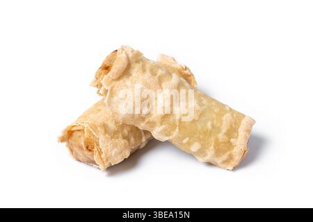 Crispy vegetables spring Rolls on Ceramic Plate isolated on white background Stock Photo