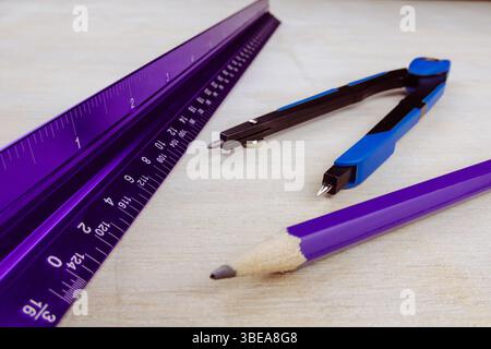 Triangle ruler compass and pencil Lets do some work Stock Photo