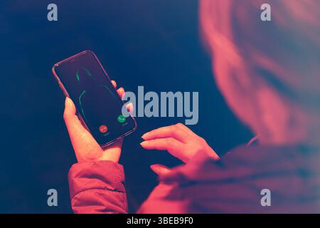 Suspicious person contacting by phone. Attempt to obtain personal data. Identity theft. Cybercrime. How to protect yourself from data and money theft Stock Photo