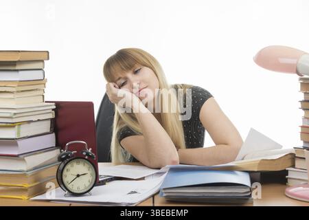 Student falls asleep looking at the screen Stock Photo
