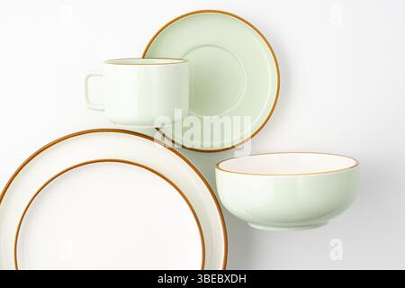 A set of ceramic tableware isolated on white background Stock Photo