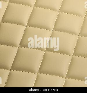 Texture of beige leather background with square pattern and stitch, macro Stock Photo