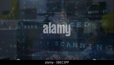 Image of cyber attack warning text and data processing over caucasian hacker Stock Photo