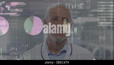Statistical data processing against portrait of caucasian senior male doctor smiling at hospital Stock Photo