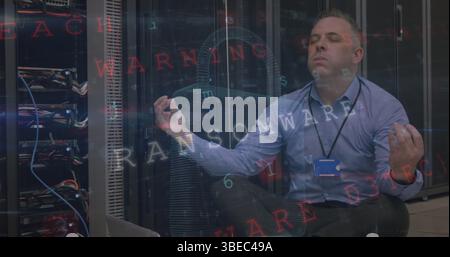 Image of data processing over caucasian server room worker Stock Photo
