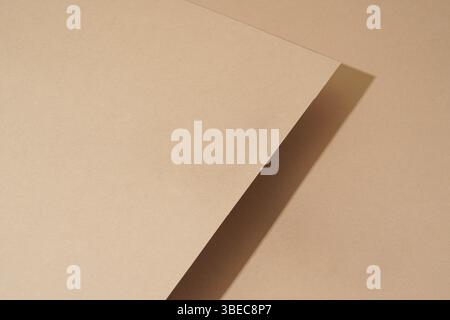 The colorful background from brown paper with shadow. Abstract geometric Stock Photo