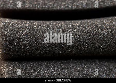 soft foam of black color for safe packaging of objects and products, foamy soft foam for giving elasticity to objects or sound insulation or as a pack Stock Photo