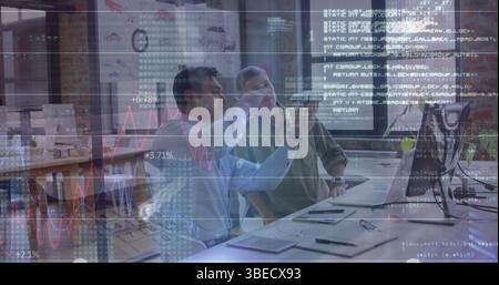 Statistical data processing over two diverse male engineers discussing over a car model Stock Photo