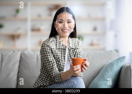Modern facial recognition technology enhances identification in daily life Stock Photo
