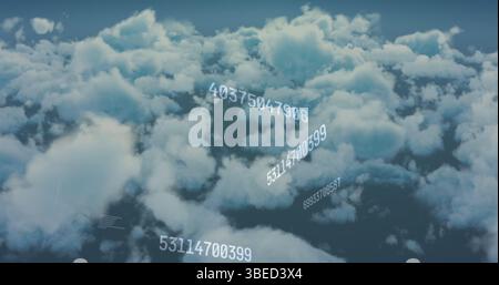 Image of multiple changing numbers floating over clouds in the sky Stock Photo