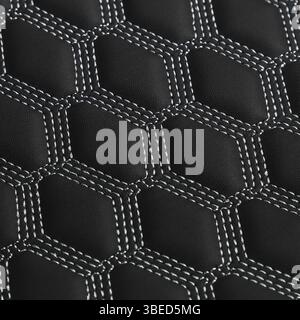 Texture of black leather background with square pattern and stitch, macro Stock Photo
