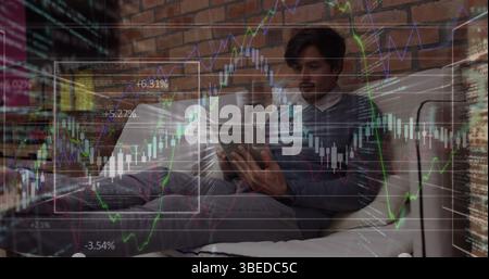 Image of financial data processing against caucasian senior using digital tablet at office Stock Photo